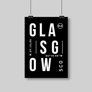 May include: Black and white poster with the word "GLASGOW" in a bold, sans-serif font. The poster also includes the coordinates 55&deg;51'40"N 04&deg;15'00"W and the text "THE TYPE QUARTER".