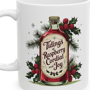 May include: White ceramic mug featuring a festive design. The mug showcases a bottle of raspberry cordial with the text "Tidings of Raspberry Cordial and Joy." Holly and pine branches surround the bottle, with red berries and green leaves.