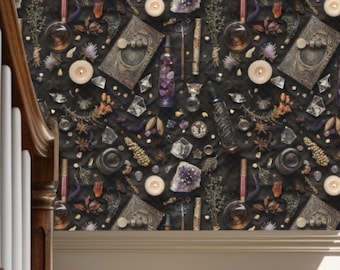 May include: Wallpaper with a dark background and a repeating pattern of mystical objects. The design includes antique books, crystals, candles, and potion bottles in shades of purple, gold, and black. The wallpaper is installed on a wall in a room with a window.
