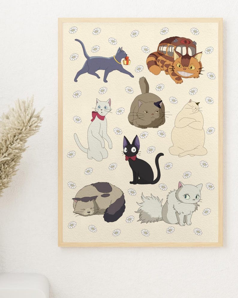 May include: A framed print featuring cartoon cats in various poses. The cats are in shades of gray, brown, and white, with some wearing accessories like a red bow tie. The background is a light beige with small white flower illustrations.