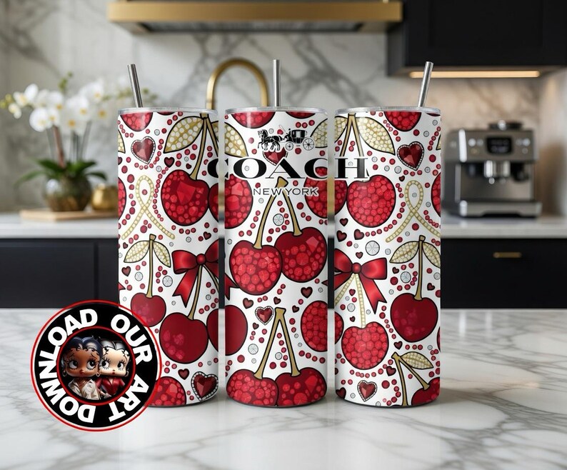 May include: Three white tumblers with a cherry pattern, red bows, and gold accents. The center tumbler features the "COACH NEW YORK" logo. Each tumbler has a silver straw.