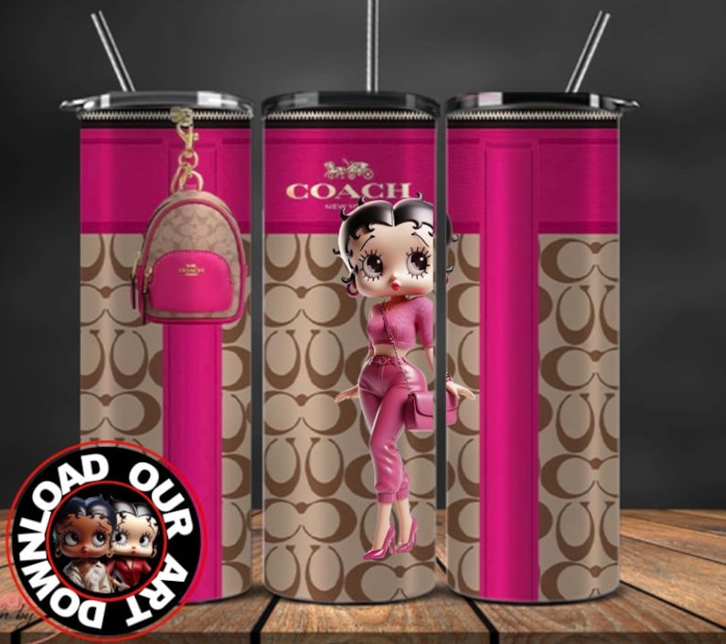 May include: A pink and brown tumbler with a design featuring the Coach logo and a cartoon image of Betty Boop. The tumbler has a black lid and a straw.