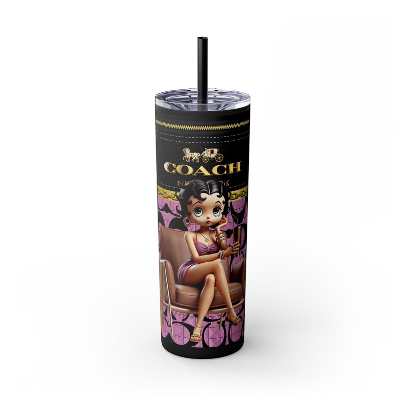 May include: A black and pink stainless steel tumbler with a cartoon image of a woman sitting on a chair. The tumbler has the word "COACH" printed on it.
