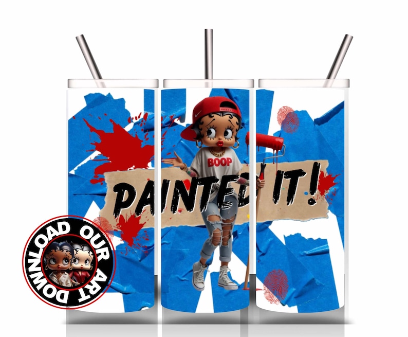May include: A white tumbler with a Betty Boop design, featuring the text "PAINTED IT!" and a Betty Boop figure holding a paint roller. The design includes blue tape, red paint splatters, and a "DOWNLOAD OUR ART" logo.