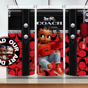 May include: A tumbler featuring a red and black design with a cartoon character taking a selfie. The tumbler has a black zipper and silver accents. The Coach logo is visible. The tumbler has a red and black pattern.