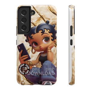 May include: A phone case featuring a cartoon character with dark skin, black hair, and gold jewelry. The character is holding a phone and wearing a black top and blue jeans. The case has a gold and beige marble design.