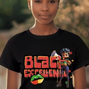 May include: Black t-shirt with the words "Black Excellence" in red and orange block letters. A cartoon figure with a megaphone and a pair of lips with the colors of the Pan-African flag are also featured.