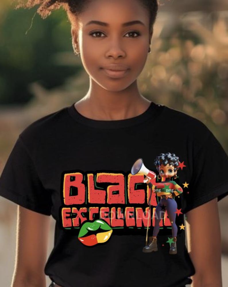 May include: Black t-shirt with the words "Black Excellence" in red and orange block letters. A cartoon figure with a megaphone and a pair of lips with the colors of the Pan-African flag are also featured.