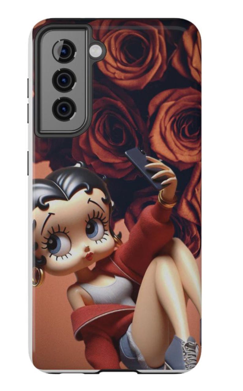 May include: A phone case featuring a cartoon character taking a selfie. The case has a red and orange color scheme with a background of roses. The character is wearing a red jacket and gray top.