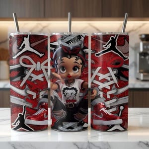 May include: Three stainless steel tumblers with straws. The tumblers feature a red glitter design with white shoelaces and a black silhouette of a person jumping. A cartoon Betty Boop character is in the center tumbler, wearing a white shirt with a graphic.