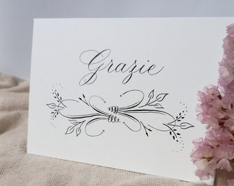 Biglietto di ringraziamento scritto a mano con decorazione