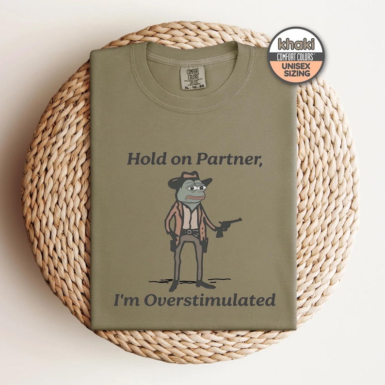 Pepe The Frog Meme Shirt, Overstimulated Shirt, Hold On Partner I'm Overstimulated Shirt, Gender-Neutral Comfort Colors® 1717 Shirt Khaki