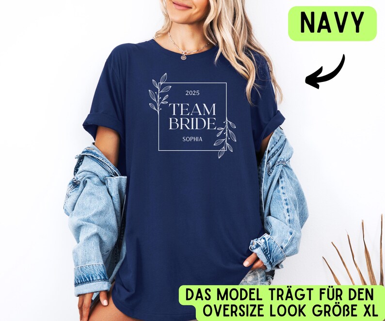 May include: Navy blue t-shirt with a white floral design and the text "2025 Team Bride. Sophia".