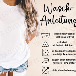 May include: A white t-shirt with a graphic of washing instructions. The instructions include machine wash cold, tumble dry low, iron medium heat, and do not dry clean.