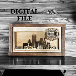 May include: A digital file for a 3D wooden model of the Indianapolis skyline, featuring the city's iconic buildings and Lucas Oil Stadium.