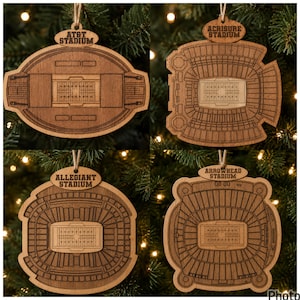 May include: Four wooden ornaments featuring laser-engraved stadium floor plans. The top left is AT&T Stadium, top right is Acrisure Stadium, bottom left is Allegiant Stadium, and bottom right is Arrowhead Stadium. Each piece has a hanging twine loop.