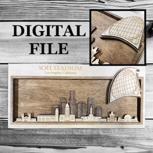 May include: A digital file for a wooden model of SoFi Stadium in Los Angeles, California. The model features a detailed cityscape with buildings and a large, curved roof.