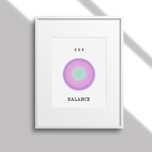 Puede incluir: Una impresión enmarcada con un diseño circular rosa, morado y azul con la palabra "BALANCE" impresa debajo del círculo y la palabra "666" impresa encima del círculo.