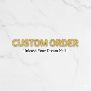 May include: A white marble background with gold glitter text reading "CUSTOM ORDER" and the tagline "Unleash Your Dream Nails". The text is centrally positioned, suggesting a custom nail art service or product.