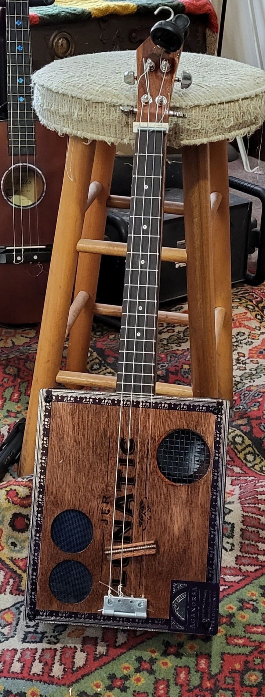 4 string acoustic/Electric Cigarbox Baritone Ukulele with DGBE tuning.