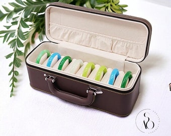 Organiseur de bracelet en cuir PU végétalien de qualité supérieure, boîte de bracelet en cuir professionnelle, organisateur de bijoux portable élégant, rangement de voyage pour bracelet.