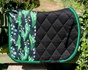 Black and green mixed saddle pad with lily of the valley pattern for horse or pony size D (COB) - personalised with embroidered first name