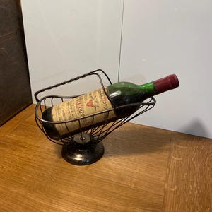 silver metal bottle holder