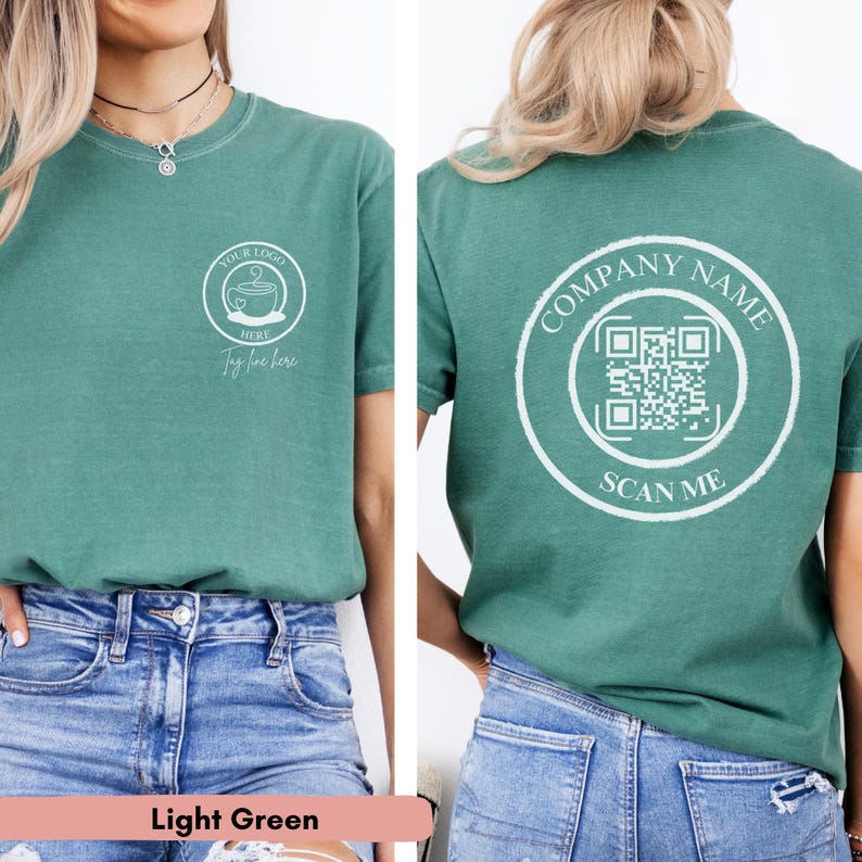 May include: A light green t-shirt with a white circle on the front that says "Your Logo Here" and a white circle on the back that says "Company Name" with a QR code and "Scan Me".