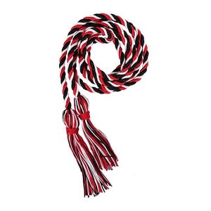 May include: A graduation honor cord in a spiral shape, featuring alternating strands of red, black, and white. The cord has two tassels at the end, also in red, black, and white. The background is plain white.
