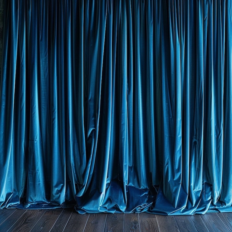 May include: A close-up of a blue velvet curtain backdrop. The curtain is made of soft, flowing fabric and has a rich, deep blue color.