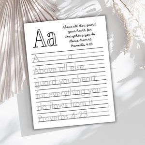 May include: A printable worksheet featuring the letter "A" and a Bible verse from Proverbs 4:23, "Above all else, guard your heart, for everything you do flows from it." The worksheet includes lines for tracing the letter and writing the verse.