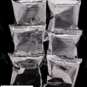 May include: Six silver metallic pouches of Starbucks Matcha Ground Green Tea arranged in two columns. Each pouch features the text Starbucks Matcha, Ground Green Tea, Thé vert moulu, and Not for retail sale, Vente au détail interdite.