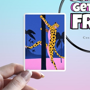 May include: A rectangular sticker featuring a stylized illustration of a cheetah climbing a tree. The cheetah has yellow fur with black spots and a pink belly. The background is a gradient of blue and pink, with palm trees.