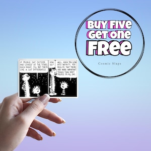 A hand holding a sticker mockup depicting a beautiful quality calvin and hobbes black and white sticker as they ponder infinity. From Stardew Valley Shop Etsy Sticker Store. SDVS