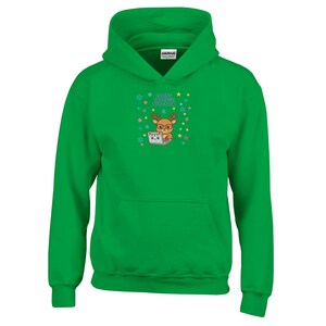 May include: A bright green hooded sweatshirt with a kangaroo pocket. The front features a cartoon reindeer wearing glasses and working on a laptop, with the text "Coding Through The Snow" above it. Colorful stars and snowflakes surround the reindeer.