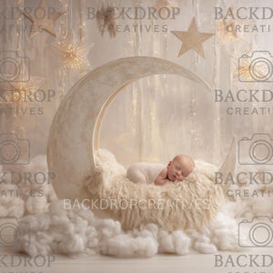 May include: A newborn baby sleeps peacefully on a fluffy, cream-colored surface inside a crescent moon prop. The backdrop features soft lighting, clouds, and star decorations, creating a dreamy, celestial theme.