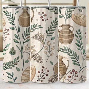May include: A tumbler with a repeating pattern of bread, jugs, and botanical elements in shades of brown, green, and beige. The design includes illustrations of leaves, berries, and wheat, creating a rustic, farmhouse aesthetic.