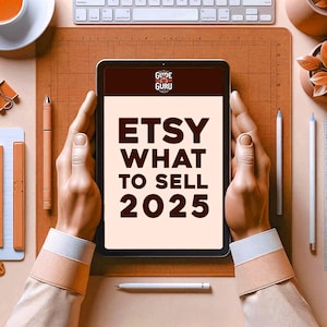 May include: A tablet computer screen displaying the text "Etsy What To Sell 2025" in brown text on a light peach background. The text "Guide for Guru" is displayed in white text on a red background in the top left corner of the screen.