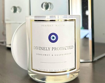 Divinely Protected Evil Eye Protection Candle | Crackling Wood Wick | Bergamot & Grapefruit Scented Soy Wax Candle | Iridescent Candle Jar