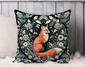 May include: A black throw pillow with a colorful fox surrounded by green and white floral designs. The fox is sitting in the center of the pillow and has a bushy tail.