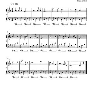 May include: Piano sheet music for "Silent Night" by Franz Gruber, with musical notation in black ink on white paper. The score includes treble and bass clefs, notes, and dynamic markings. The tempo is marked at 100 beats per minute. The title is written in English and Vietnamese.