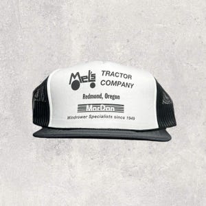 Mel&#39;s Tractor Company Vintage Trucker Snapback Hat