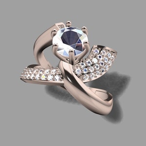 May include: A rose gold engagement ring with a large, clear center stone and smaller stones set in a band that wraps around the finger.