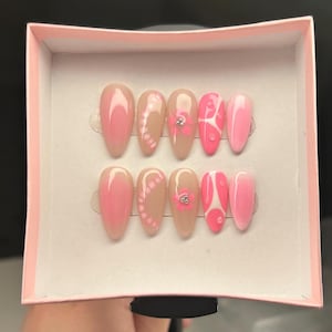 Pink aura nails