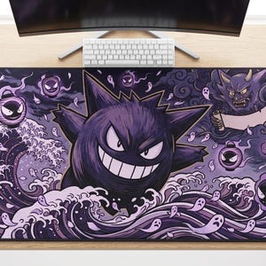 May include: A rectangular desk mat featuring a purple and black illustration of a round, spiky creature with a wide grin, surrounded by stylized waves, floating ghost figures, traditional lanterns, and a horned figure holding a blank scroll.