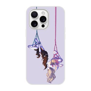 May include: Two figures are tied up and hanging from the ceiling. The figures are tied with pink and blue rope. The background is a light purple color.