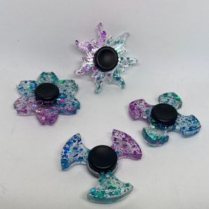 Driekleurige glitterfidgetspinner