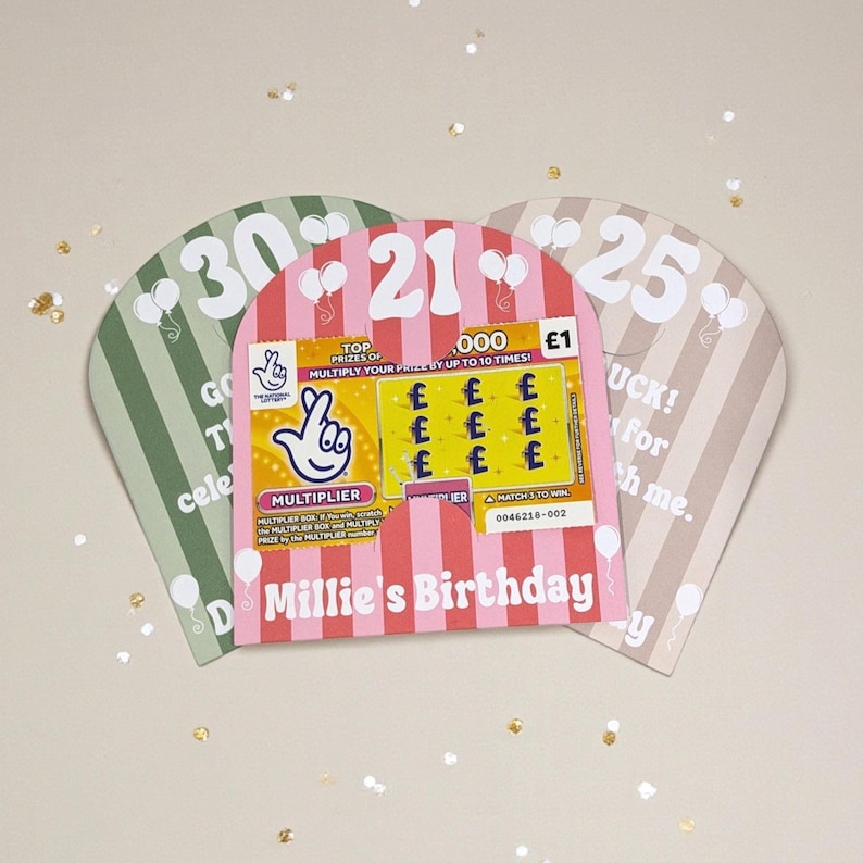 May include: Three birthday-themed scratch-off card holders. The center card is pink and white striped with a scratch-off ticket that says "Millie's Birthday". The other two are green and tan with the numbers 30, 21, and 25.