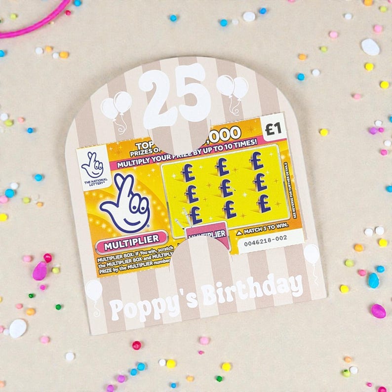 May include: A birthday card with a lottery ticket. The card is beige with vertical stripes and the number 25 at the top. The lottery ticket is yellow and features the text "MULTIPLIER" and "Poppy's Birthday".