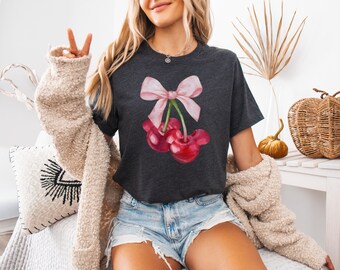 Camiseta Coquette Cherry: Lazo rosa, camiseta vintage femenina